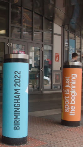 Vertical-Video-Of-Advertising-For-2022-Commonwealth-Games-At-Tram-Stop-In-Birmingham-City-Centre-UK